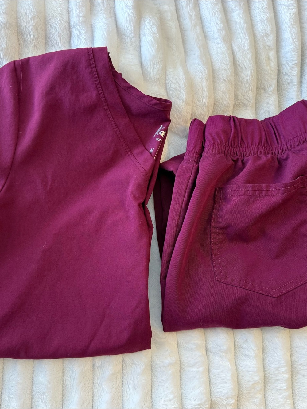 Set of burgundy scrubs